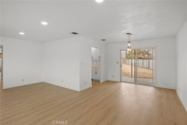 7010 Airway Ave, Yucca Valley, CA 92284 - empty room featuring light wood-style flooring, baseboards, and recessed lighting