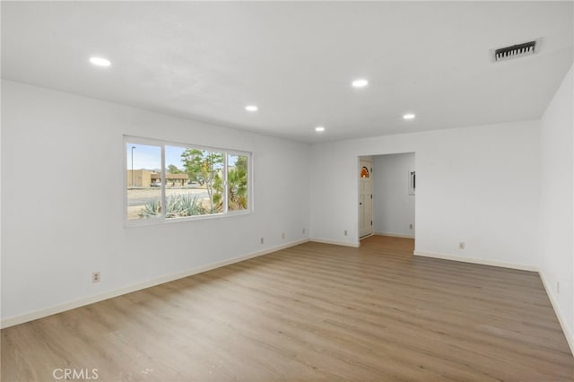 7010 Airway Ave, Yucca Valley, CA 92284 - empty room with recessed lighting, light wood finished floors, and baseboards