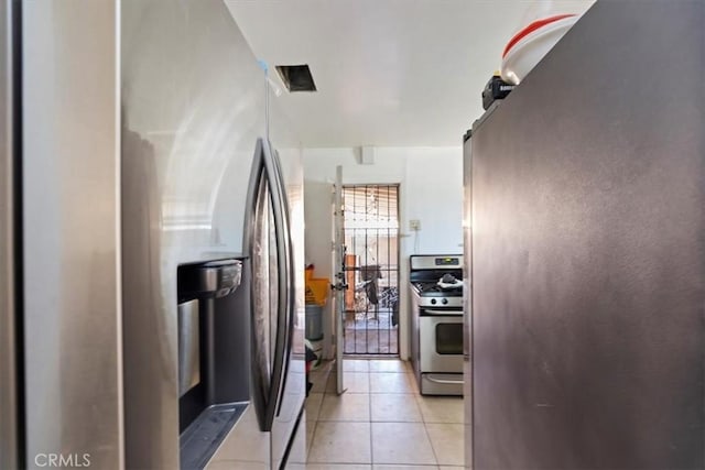 1218 S Sultana Ave Unit A, Ontario, CA 91761 - kitchen with stainless steel appliances and light tile patterned floors
