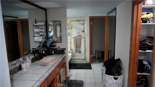 9322 Candlelight St, Apple Valley, CA 92308 - full bathroom with vanity, a stall shower, and tile patterned floors