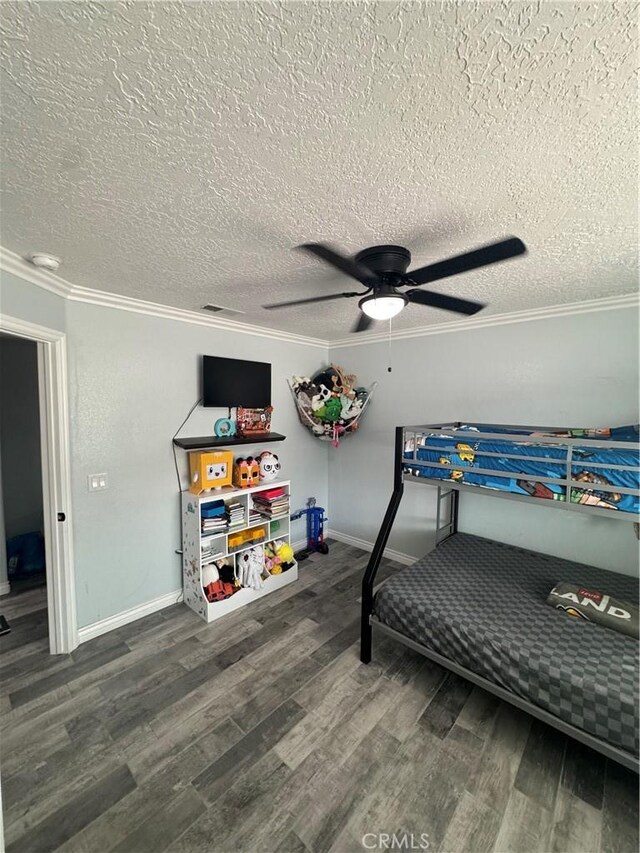 9322 Candlelight St, Apple Valley, CA 92308 - bedroom with crown molding, wood finished floors, a textured ceiling, ceiling fan, and baseboards