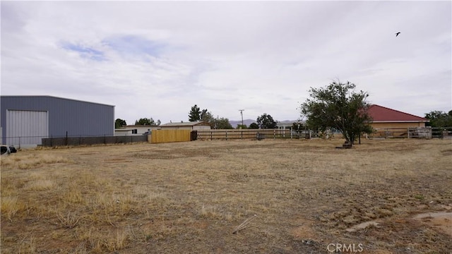 9322 Candlelight St, Apple Valley, CA 92308 - view of yard with a pole building