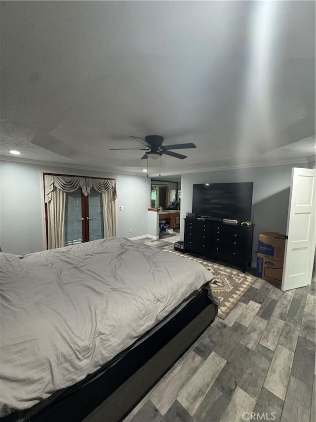 9322 Candlelight St, Apple Valley, CA 92308 - bedroom with wood finished floors, ceiling fan, french doors, and recessed lighting