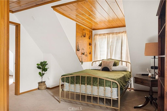 664 Yukon Rd, Green Valley Lake, CA 92341 - bedroom with wooden ceiling, carpet flooring, vaulted ceiling, and baseboards