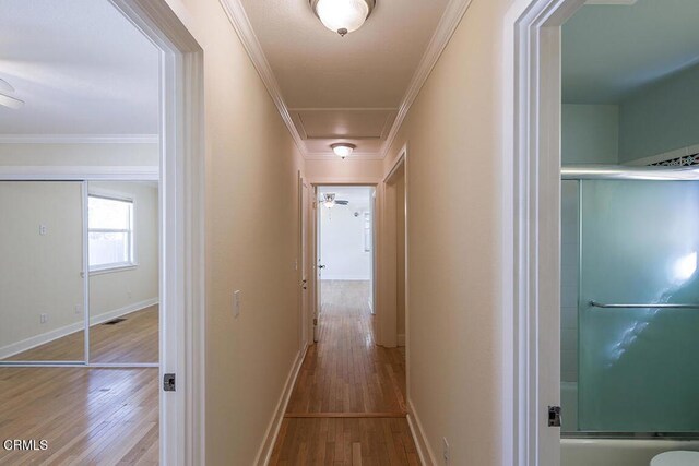 3115 Evelyn St, La Crescenta, CA 91214 - hallway featuring wood finished floors, attic access, ornamental molding, and baseboards