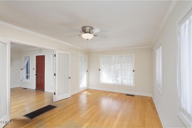 3115 Evelyn St, La Crescenta, CA 91214 - spare room with healthy amount of natural light, light wood finished floors, a ceiling fan, baseboards, and ornamental molding