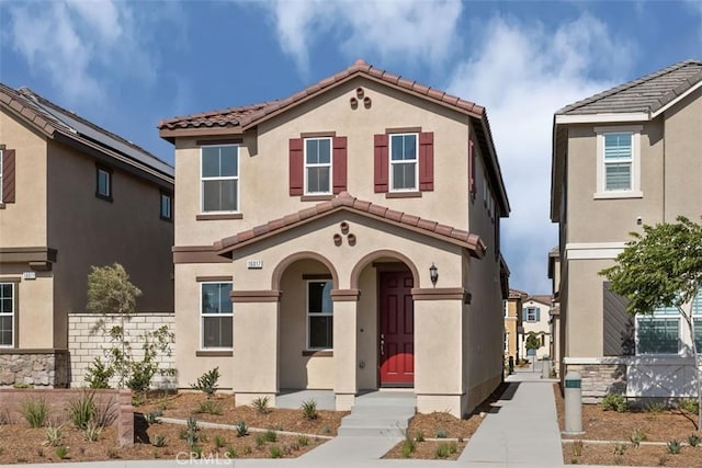 16017 E Preserve Loop, Chino, CA 91708 - view of front facade with a tiled roof and stucco siding