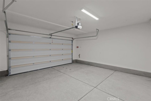 16017 E Preserve Loop, Chino, CA 91708 - garage featuring a garage door opener and baseboards