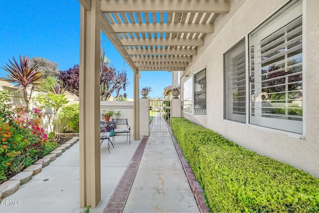 885 Oakland Hills Dr, Banning, CA 92220 - view of patio with a gate and a pergola