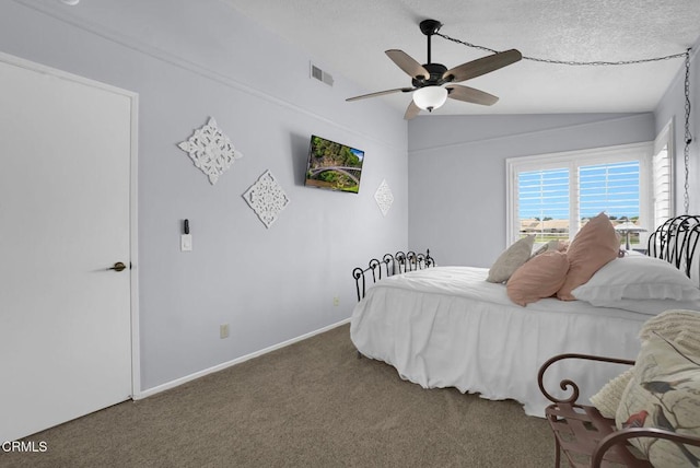 885 Oakland Hills Dr, Banning, CA 92220 - bedroom featuring lofted ceiling, carpet, a ceiling fan, baseboards, and a textured ceiling