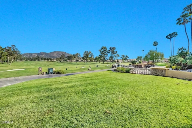 885 Oakland Hills Dr, Banning, CA 92220 - view of property's community with a mountain view, a yard, and golf course view