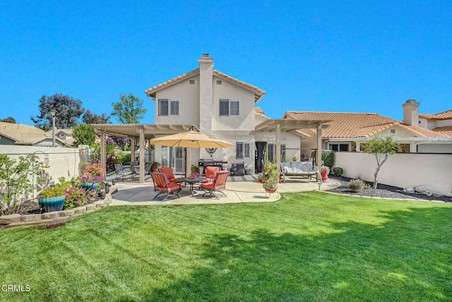 885 Oakland Hills Dr, Banning, CA 92220 - back of property featuring a pergola, a patio, a chimney, and stucco siding