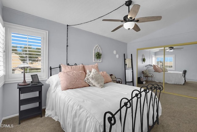 885 Oakland Hills Dr, Banning, CA 92220 - bedroom featuring carpet, vaulted ceiling, a closet, ceiling fan, and baseboards