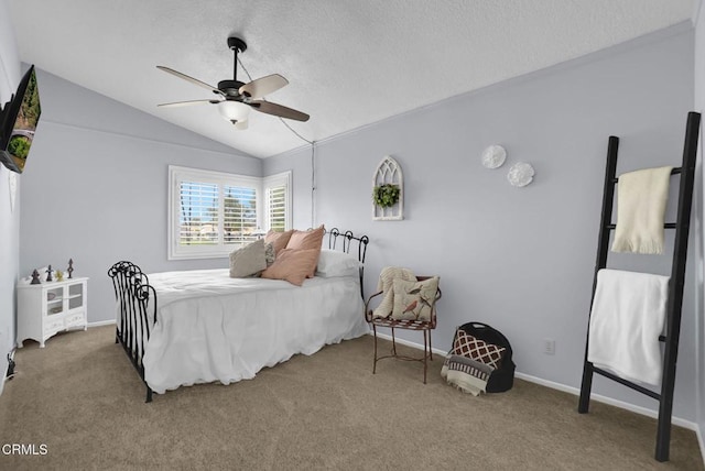 885 Oakland Hills Dr, Banning, CA 92220 - carpeted bedroom with vaulted ceiling, ceiling fan, baseboards, and a textured ceiling