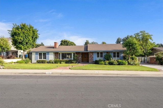 1130 Hidden Springs Ln, Glendora, CA 91741 - ranch-style house featuring a chimney