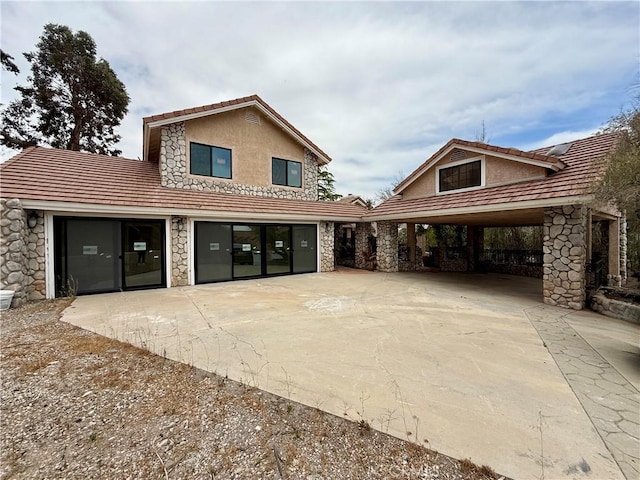 33710 Santiago Rd, Acton, CA 93510 - view of front of home featuring stone siding, a tiled roof, driveway, and stucco siding