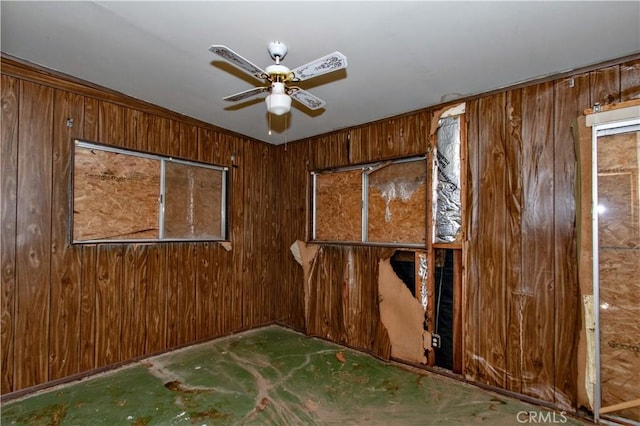 62853 Desert Trail Dr, Joshua Tree, CA 92252 - empty room with wooden walls and a ceiling fan