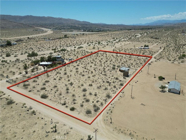 62853 Desert Trail Dr, Joshua Tree, CA 92252 - overview of rural landscape featuring a desert landscape, property boundaries highlighted, and mountains