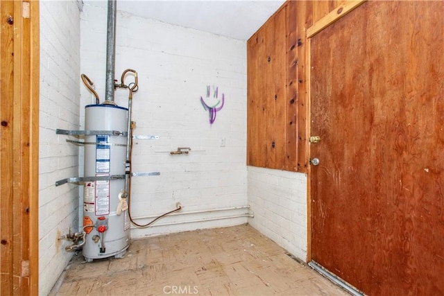 62853 Desert Trail Dr, Joshua Tree, CA 92252 - utility room featuring strapped water heater
