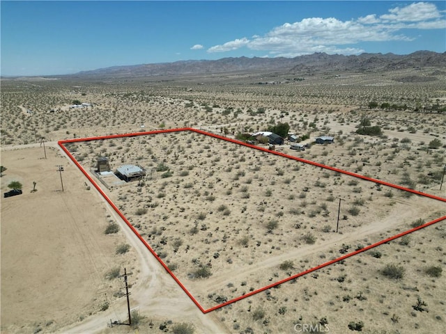 62853 Desert Trail Dr, Joshua Tree, CA 92252 - view of rural area with a desert landscape, property boundaries highlighted, and mountains