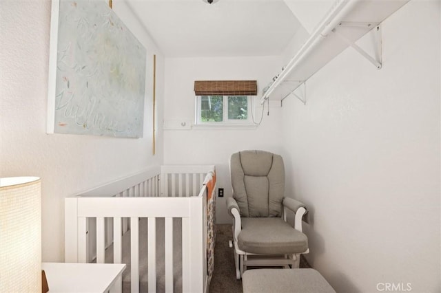 6950 Navarette Ave, Atascadero, CA 93422 - bedroom featuring a crib and carpet floors