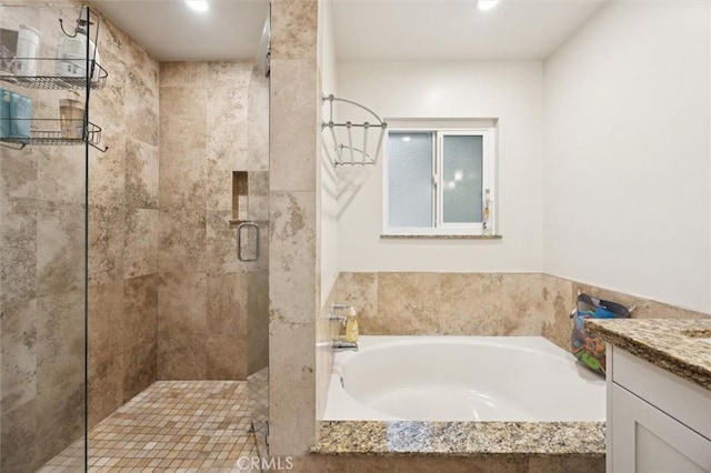 6950 Navarette Ave, Atascadero, CA 93422 - full bath with a shower stall, a garden tub, vanity, and recessed lighting