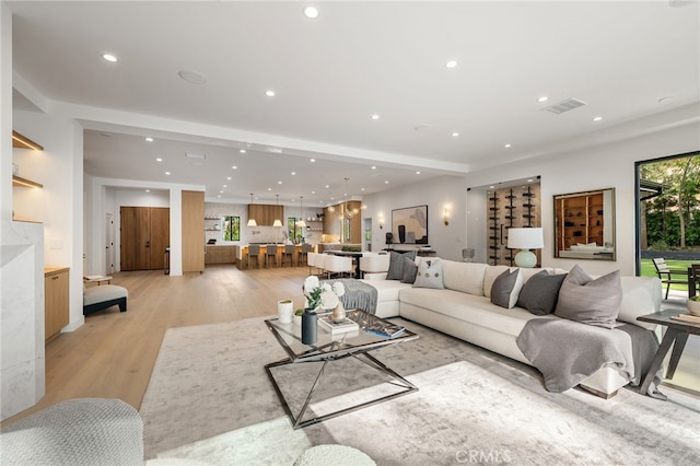 20215 Lorenzana Dr, Woodland Hills, CA 91364 - living room with recessed lighting and light wood-type flooring