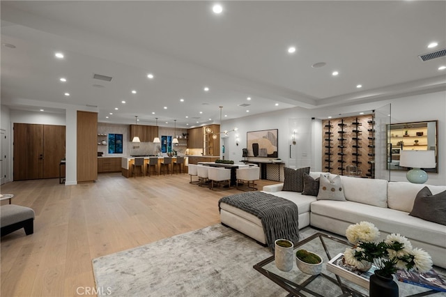 20215 Lorenzana Dr, Woodland Hills, CA 91364 - living room featuring light wood-type flooring and recessed lighting