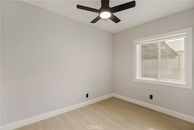 605 E Fredricks St, Barstow, CA 92311 - spare room with light wood-style floors, baseboards, and a ceiling fan