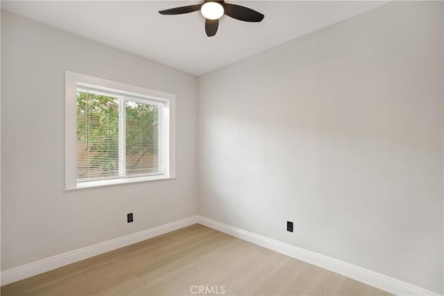605 E Fredricks St, Barstow, CA 92311 - spare room featuring light wood-style flooring, ceiling fan, and baseboards