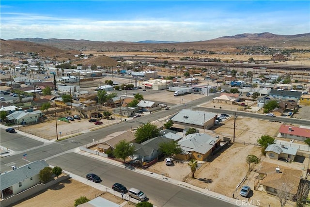 605 E Fredricks St, Barstow, CA 92311 - aerial overview of property's location with mountains and nearby suburban area