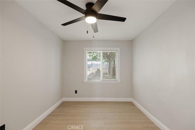 605 E Fredricks St, Barstow, CA 92311 - spare room featuring light wood-style floors, a ceiling fan, and baseboards