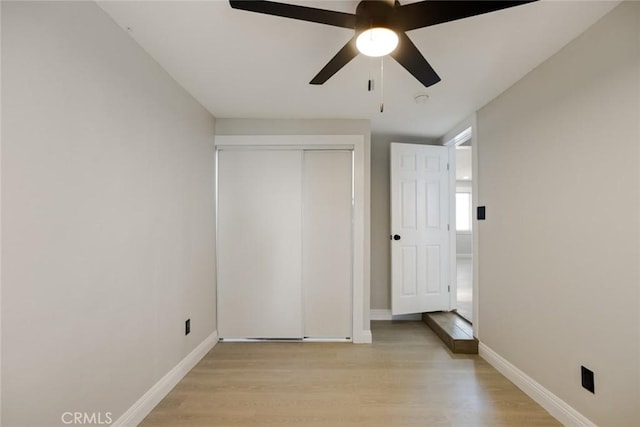 605 E Fredricks St, Barstow, CA 92311 - unfurnished bedroom with light wood-type flooring, baseboards, and a closet