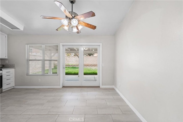 45634 Berkshire St, Lancaster, CA 93534 - unfurnished dining area featuring ceiling fan, baseboards, and light tile patterned floors