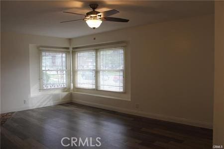 1679 N 2nd Ave, Upland, CA 91784 - unfurnished room featuring plenty of natural light, wood finished floors, and a ceiling fan