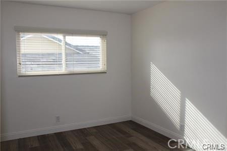 1679 N 2nd Ave, Upland, CA 91784 - unfurnished room featuring dark wood-style flooring and baseboards