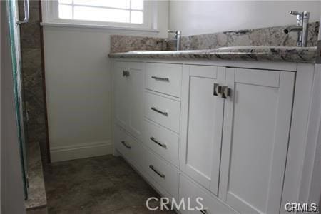 1679 N 2nd Ave, Upland, CA 91784 - full bathroom with double vanity and a shower