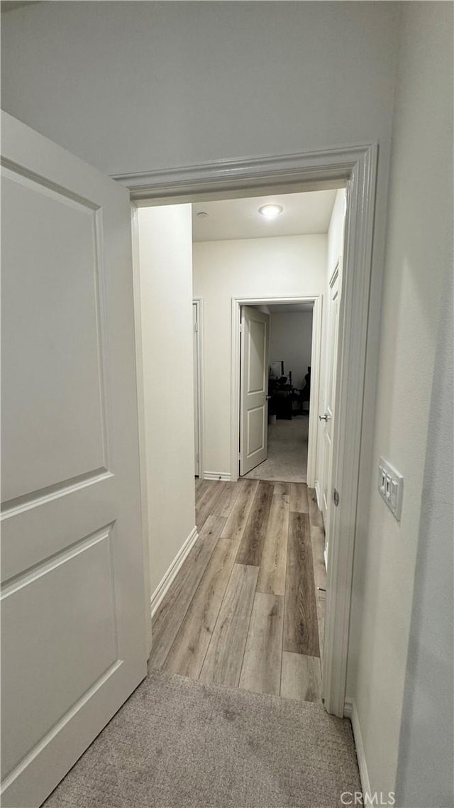 1416 Vigilant, Carson, CA 90746 - hall with light wood finished floors and baseboards