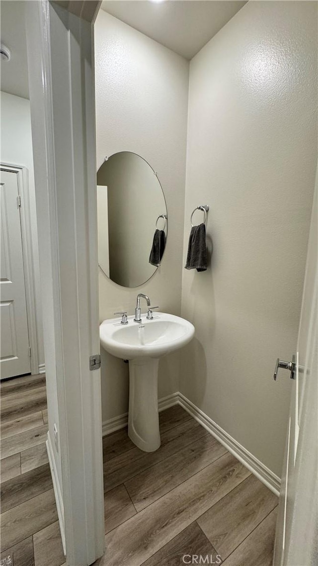 1416 Vigilant, Carson, CA 90746 - bathroom with wood finished floors and baseboards