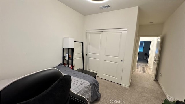 1416 Vigilant, Carson, CA 90746 - bedroom featuring light colored carpet, a closet, and baseboards