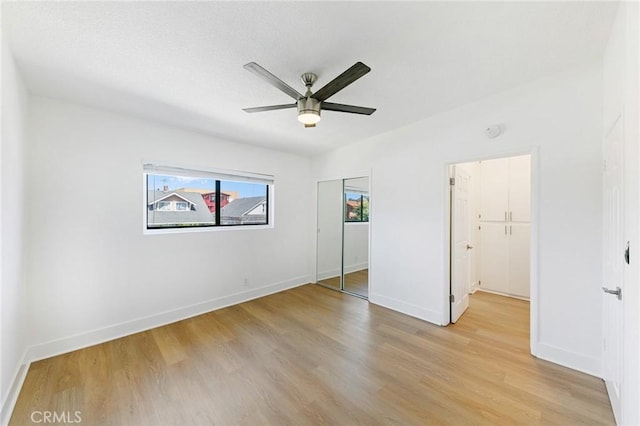 1242 Cedar Ave, Long Beach, CA 90813 - unfurnished bedroom featuring light wood-style floors, a closet, baseboards, and ceiling fan