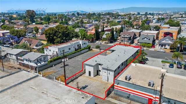 1242 Cedar Ave, Long Beach, CA 90813 - aerial view of residential area featuring property boundaries highlighted and a mountain backdrop