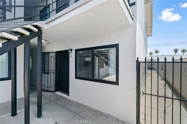 1242 Cedar Ave, Long Beach, CA 90813 - view of exterior entry with stucco siding