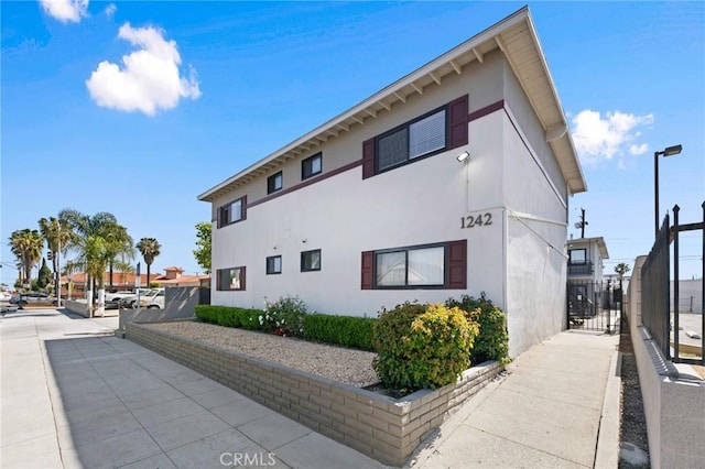 1242 Cedar Ave, Long Beach, CA 90813 - view of property exterior featuring stucco siding