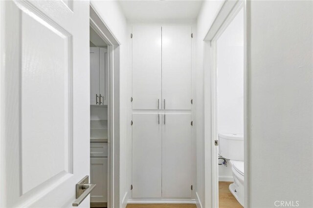 1242 Cedar Ave, Long Beach, CA 90813 - bathroom featuring toilet and wood finished floors