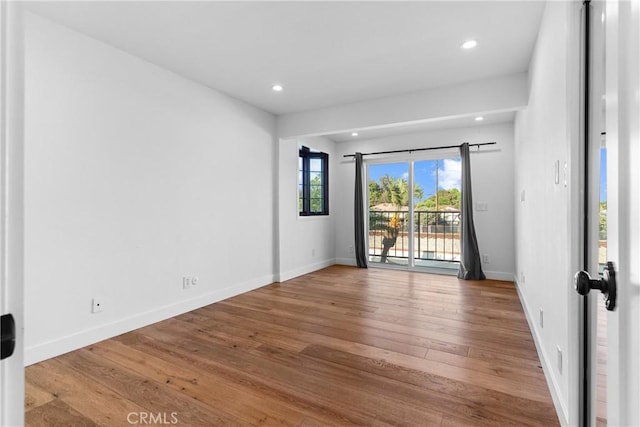 5144 Meadow Wood Ave, Lakewood, CA 90712 - empty room featuring wood finished floors and recessed lighting