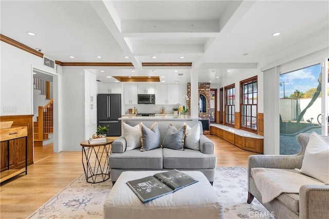 5144 Meadow Wood Ave, Lakewood, CA 90712 - living area featuring light wood-style floors, beam ceiling, coffered ceiling, recessed lighting, and ornamental molding