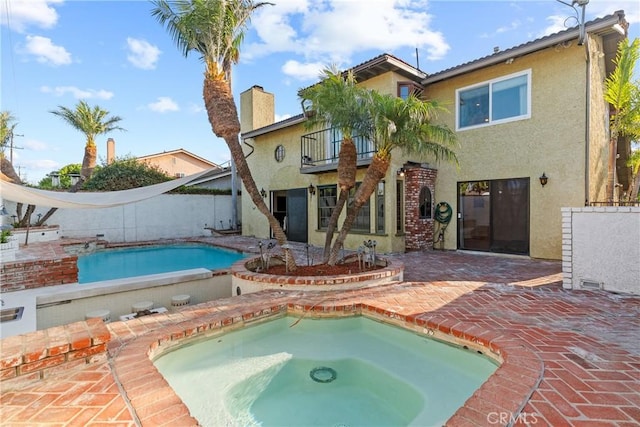 5144 Meadow Wood Ave, Lakewood, CA 90712 - view of swimming pool featuring an in-ground hot tub and a patio area