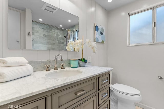 5144 Meadow Wood Ave, Lakewood, CA 90712 - full bathroom featuring vanity, a tile shower, backsplash, and recessed lighting
