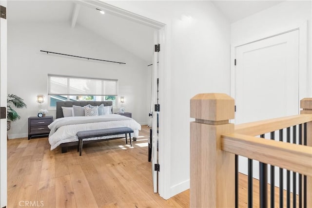 5144 Meadow Wood Ave, Lakewood, CA 90712 - bedroom with beam ceiling, light wood finished floors, and high vaulted ceiling